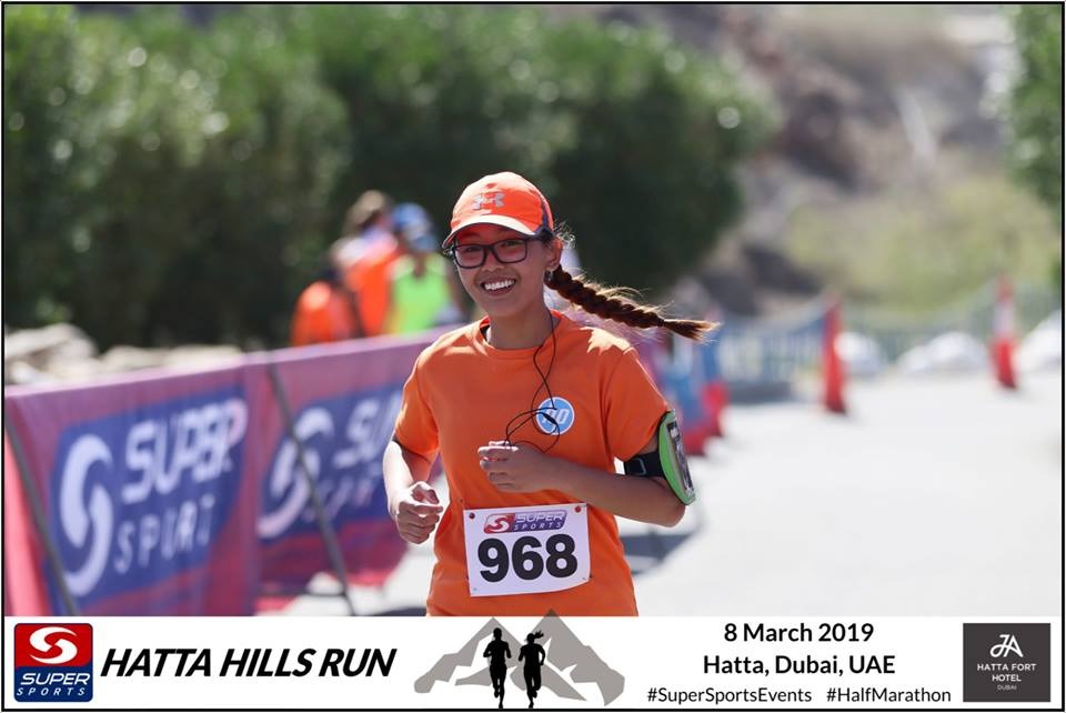 Crossing the finish line of Half Marathon Race