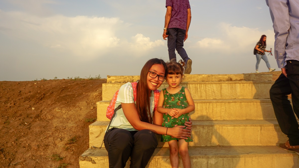 Picture with Azeri girl (father taking the photo in the shadow)