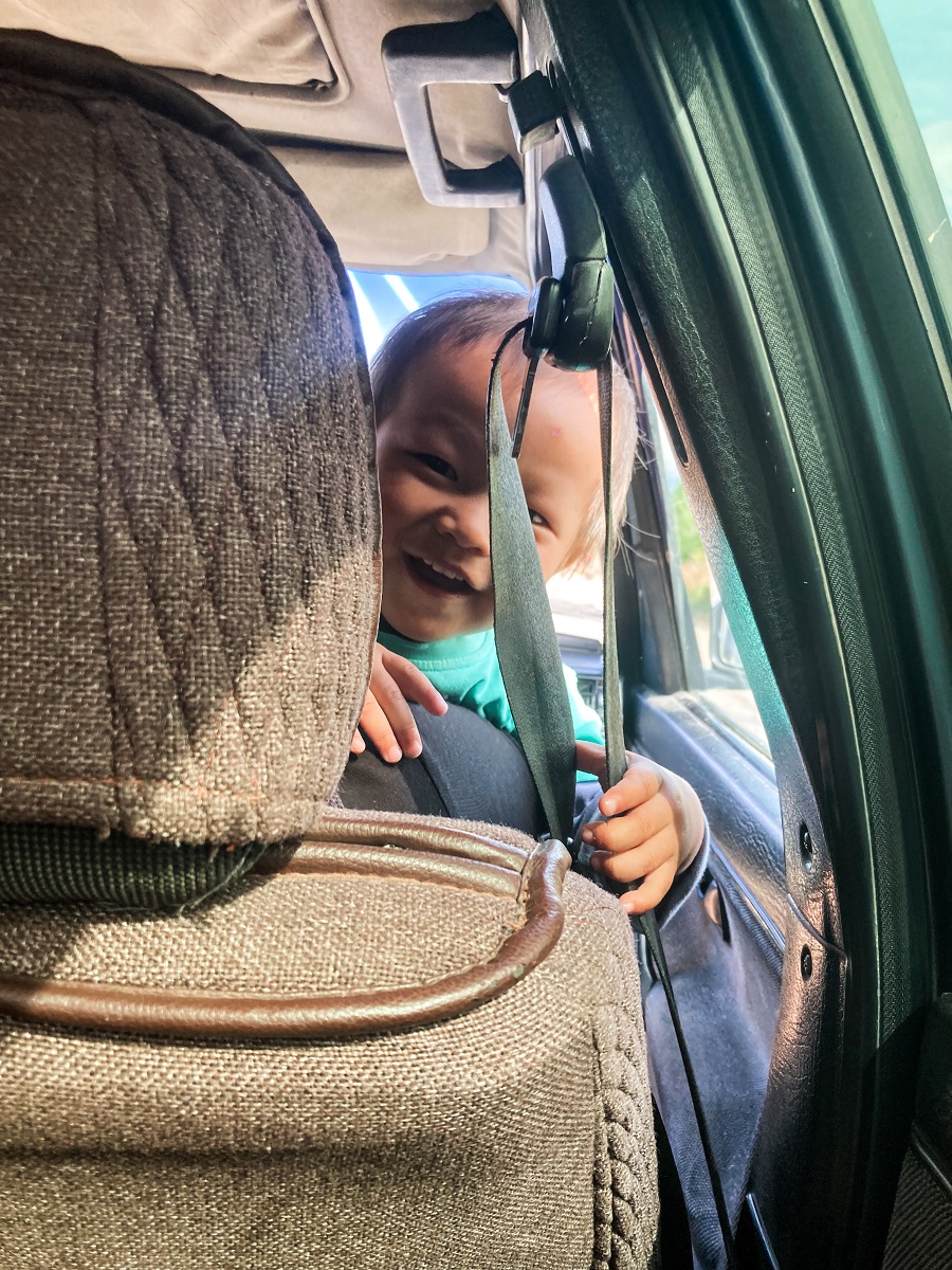 Toddler playing with me during my Hitch Hiking Experience