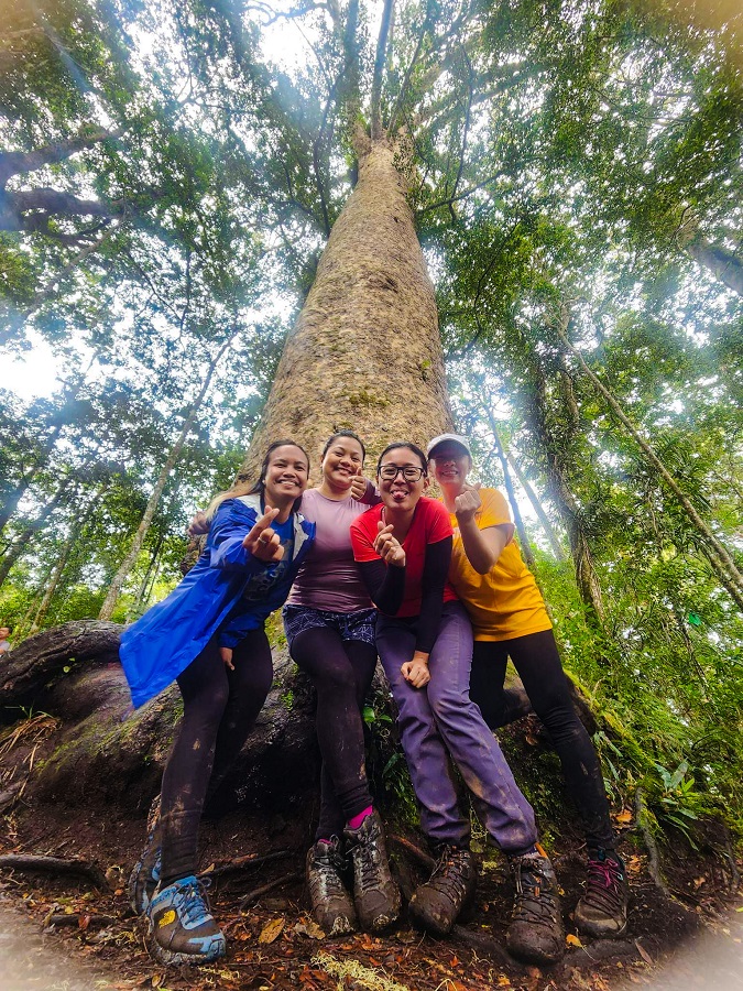 Group photo with the famous Century Tree of Mount Apo 