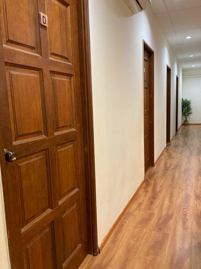 Hallway with Single Rooms of BK Hostel in Bandar Seri Begawan, Brunei