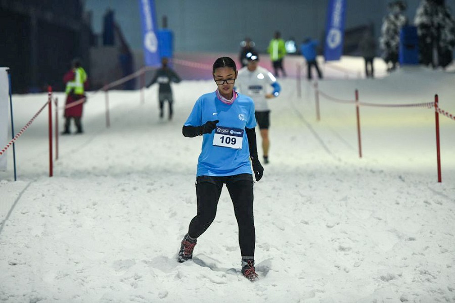 Running down during the Snow Run DXB 2023 in Ski Dubai