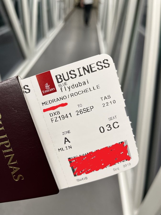 A boarding pass of my free upgrade Business Class Seat 