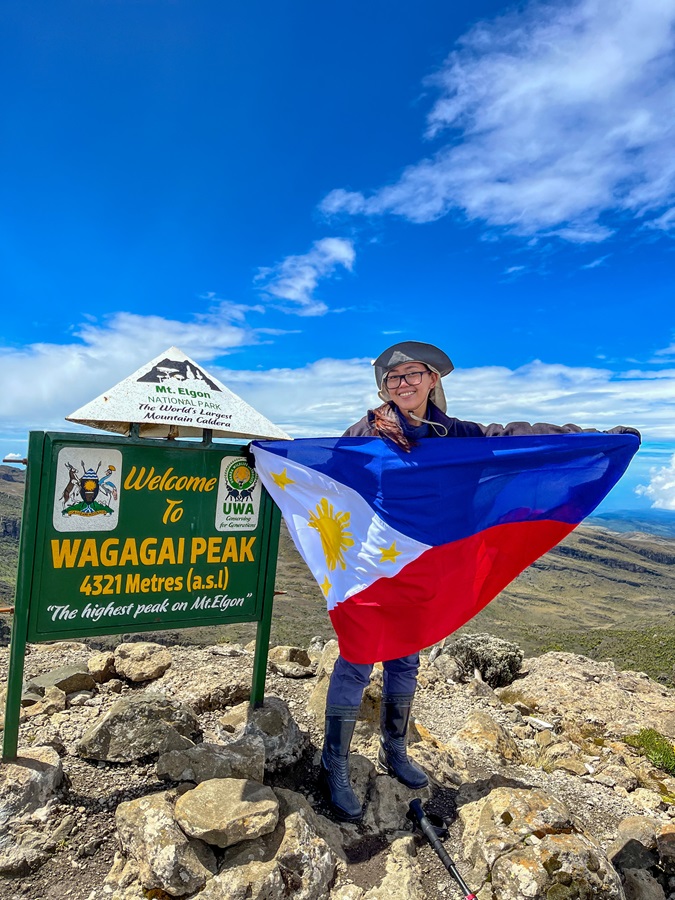 Raising the Philippine Flag at the Wagagai Peak in Mount Elgon in Uganda 