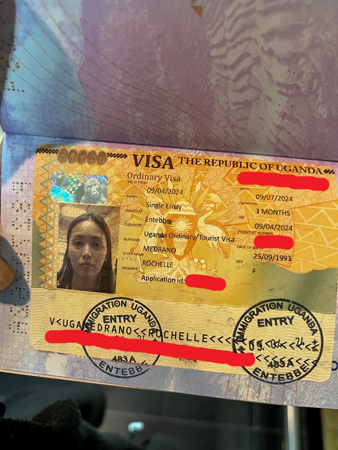 Uganda Visa stamped on the passport at Entebbe International Airport