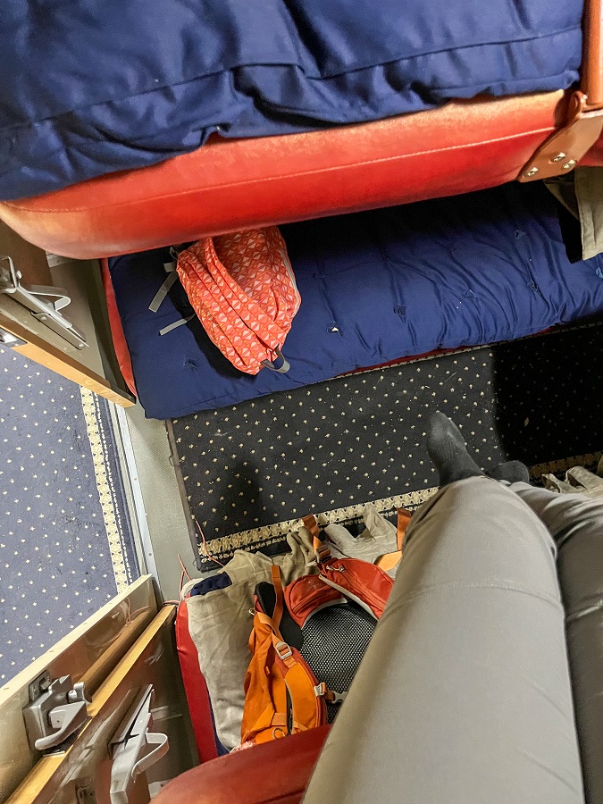 Top view of the compartment with 4 beds inside the Sleeper train from Samarkand to Tashkent via Uzbekistan Railways 