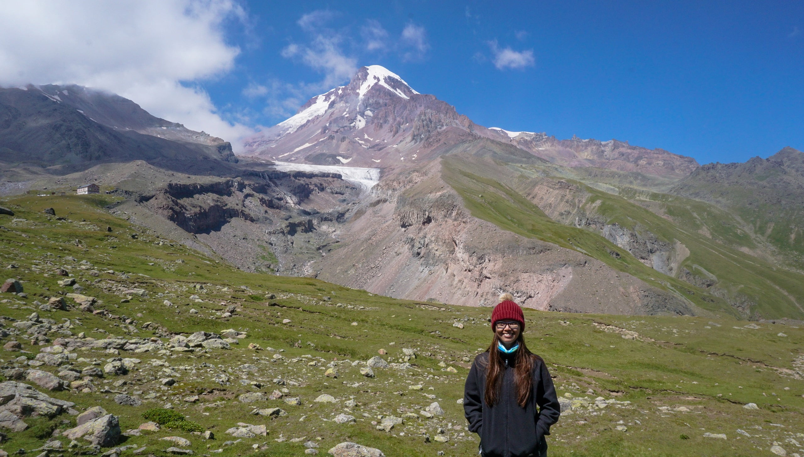 Posing with Mt Kazbek in Kazbegi, Georgia