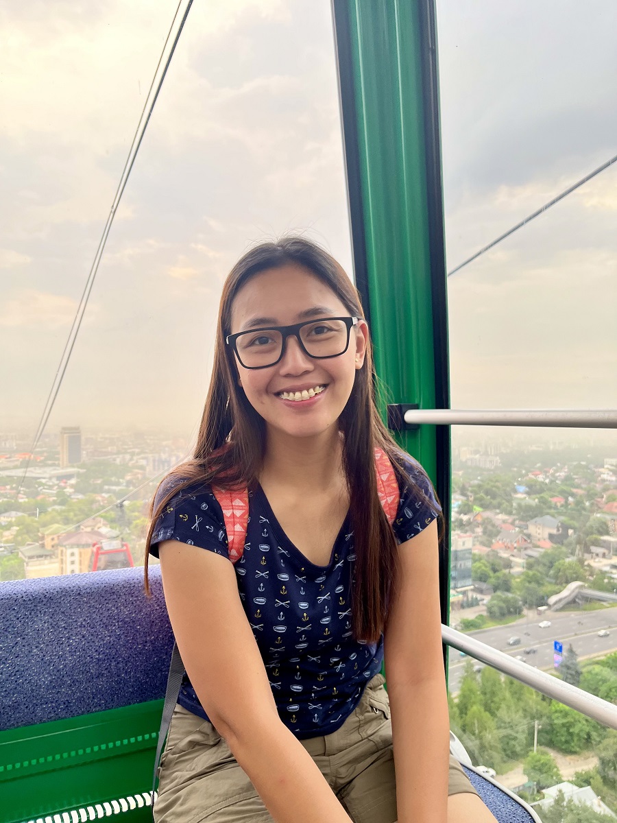 Riding the cable car to Kok Tobe Hill and photo taken by a stranger during my solo travel in Kazakhstan