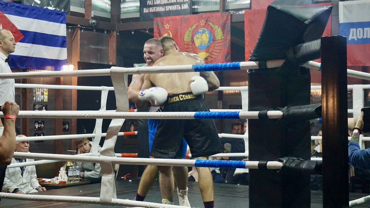 Watching a local boxing match while traveling in Russia