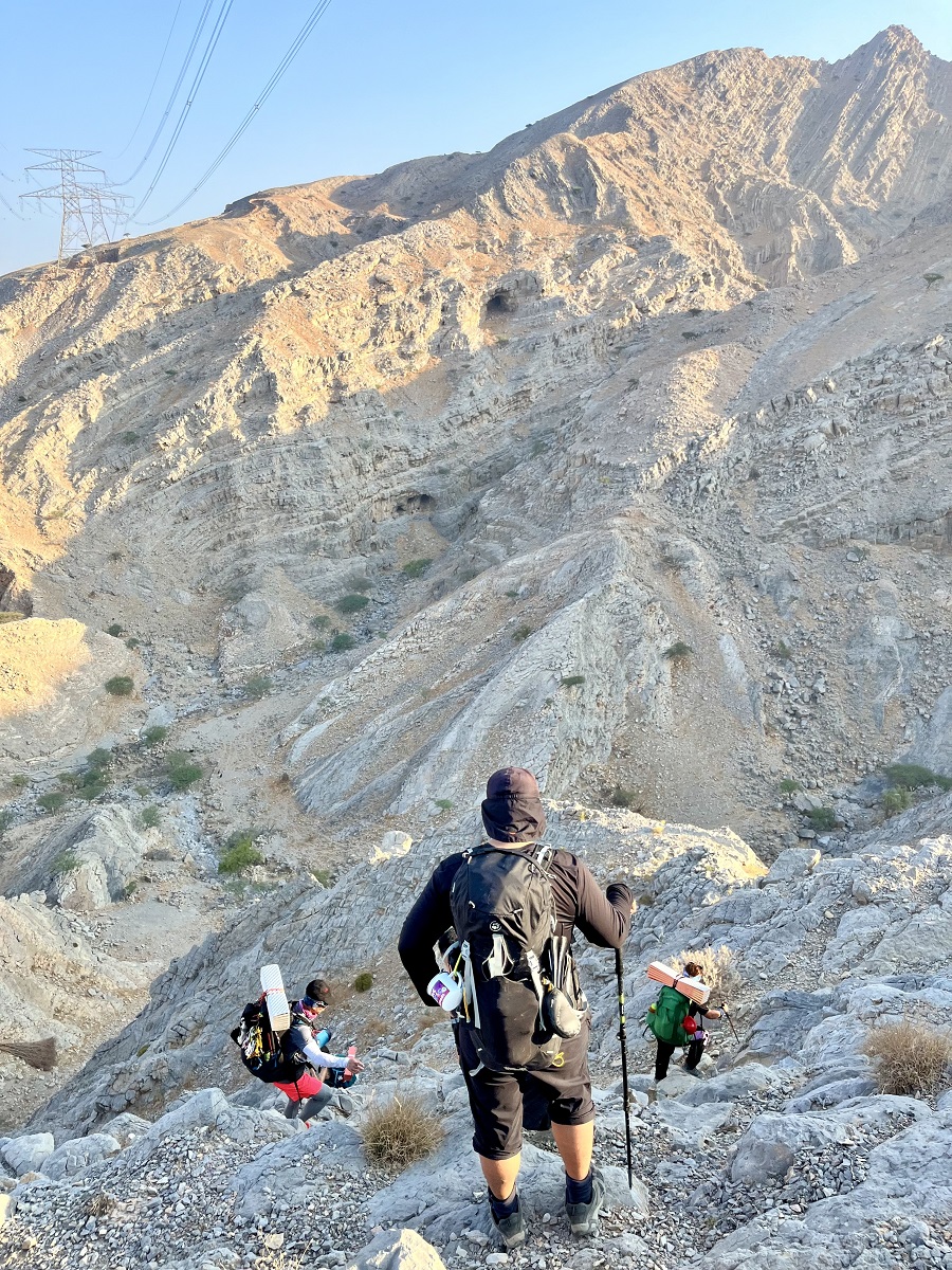 Upper and Lower Baqal Caves as seen from the cliff near Wadi Nahela