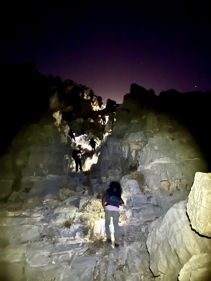 Hiking a steep hill in Banayad Trail in Ras Al Khaimah 