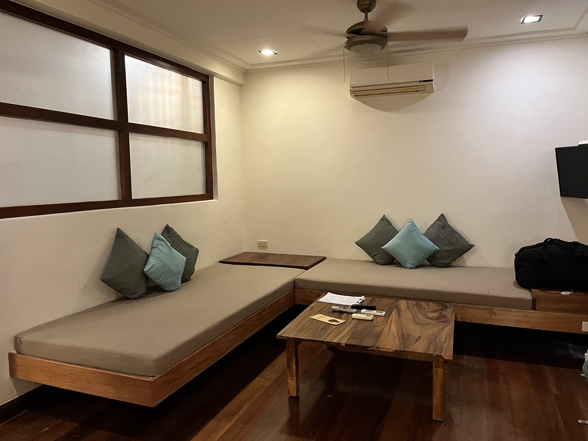 Living Room of the One-Bedroom Suite of The Strand Boutique Resort