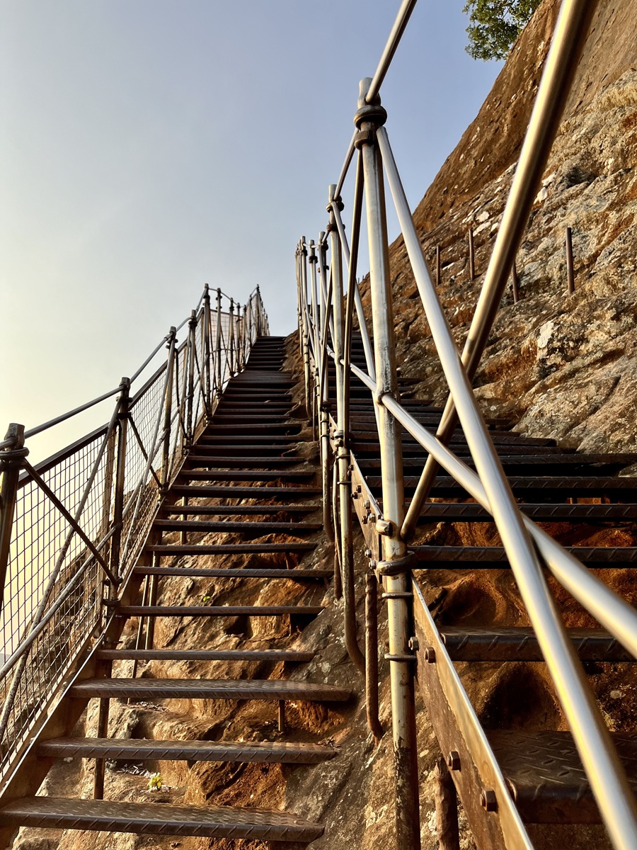 Hiking up to the summit of Sigiriya Rock via these metal stairs